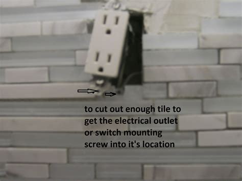 tiling around a light fixture junction box|tiling around electrical outlet.